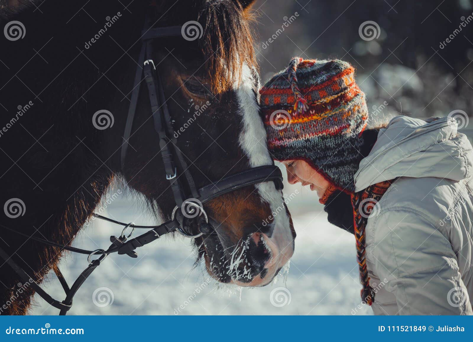 winter portrait of teen girl with horse