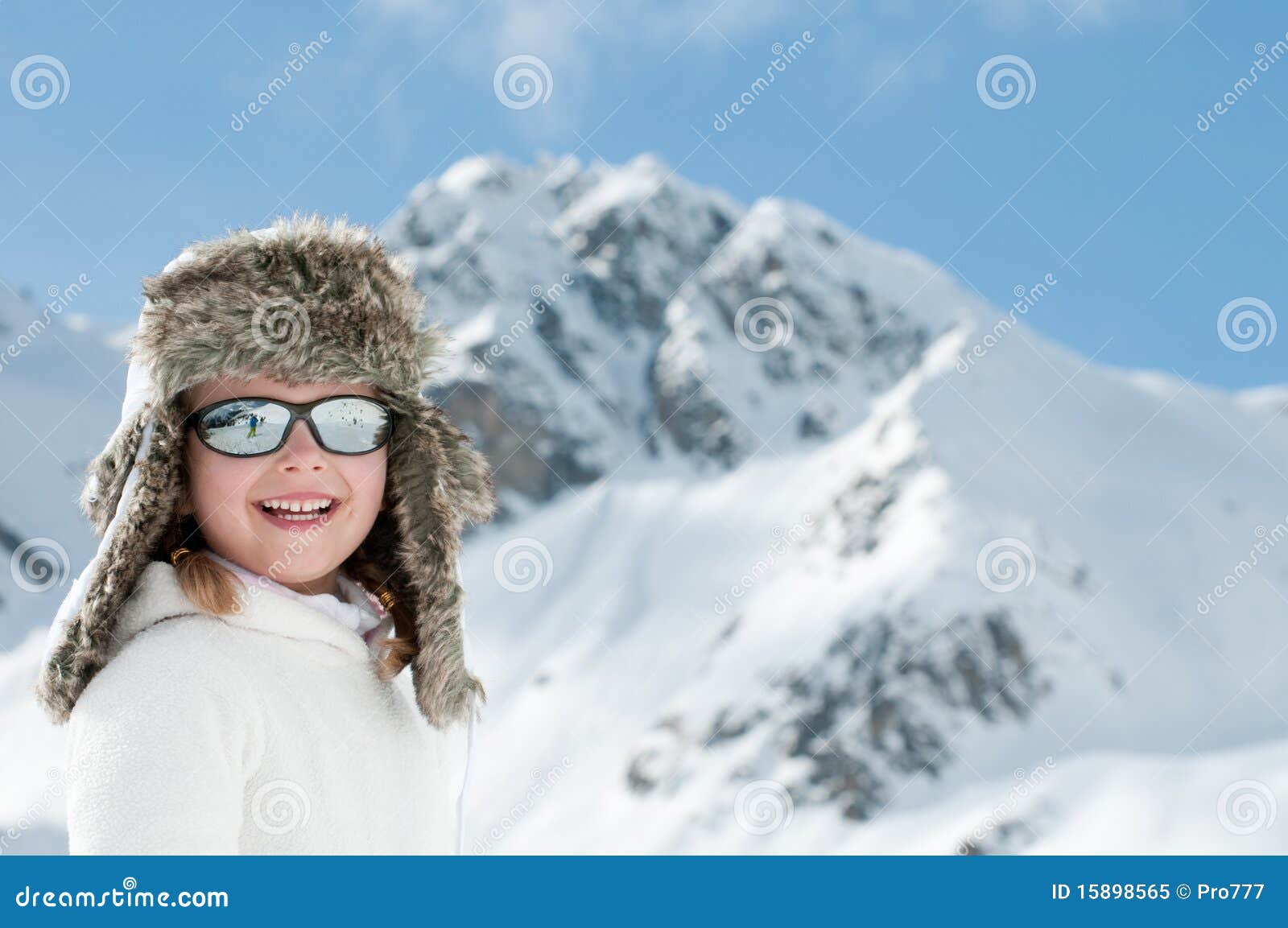 Happy little girl on winter vacations