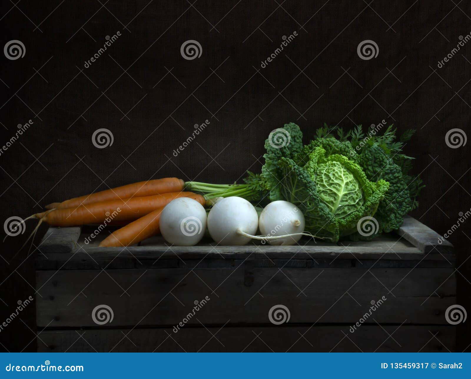 winter vegetables still life, chiaroscuro baroque style. light painting. cabbage, carrots, turnip.