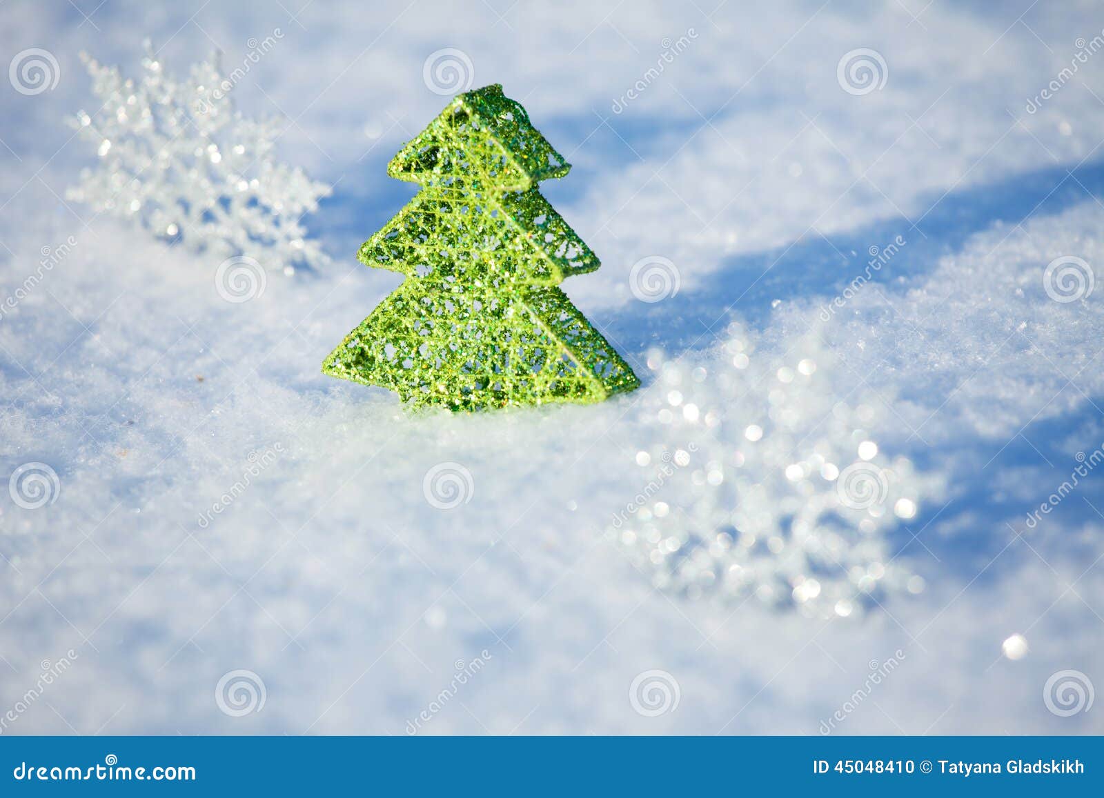 Christmas tree on snow Christmas card Winters background