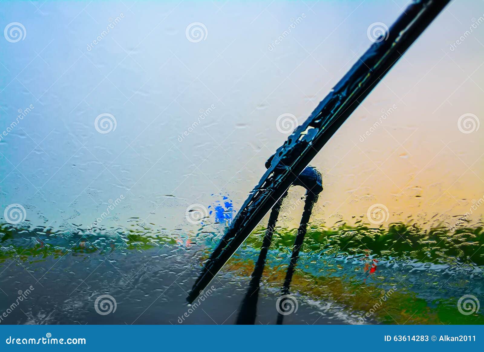 Wiper on a wet windshield stock image. Image of blurry 63614283