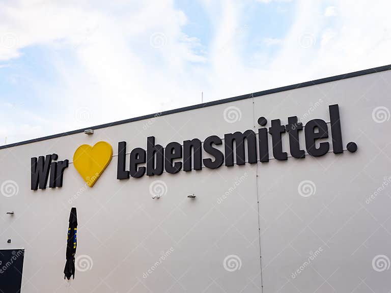 Wir Lieben Lebensmittel Slogan on an Edeka Supermarket Editorial Stock