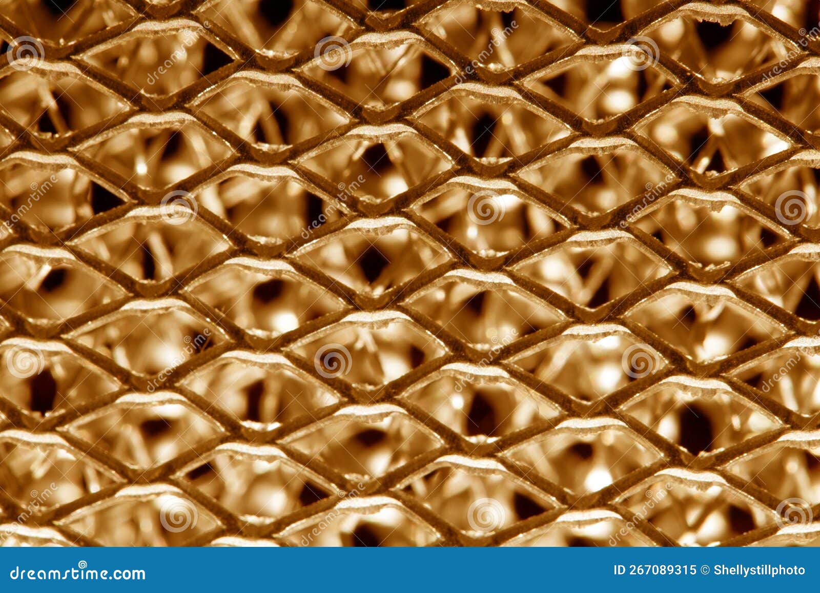 Wire Mesh Close Up Steel Surface for Background in Gold Stock Image