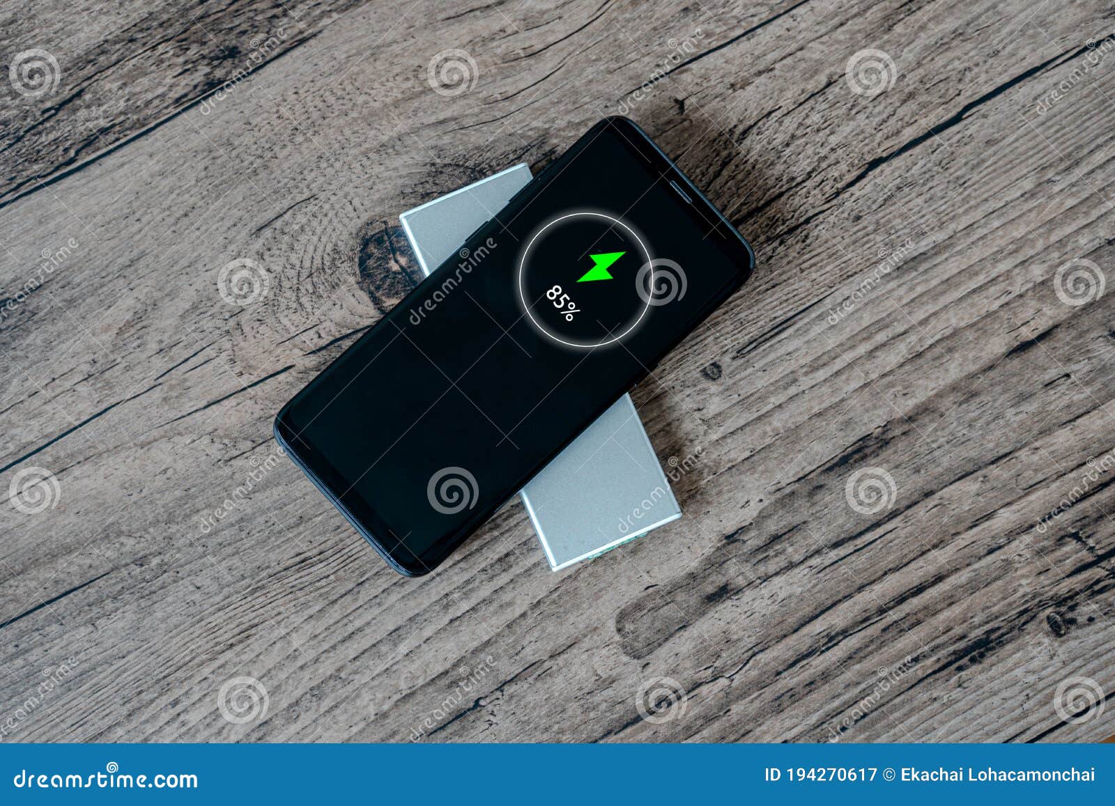 Wireless Charging of Smartphone on Restaurant Table, Concept of