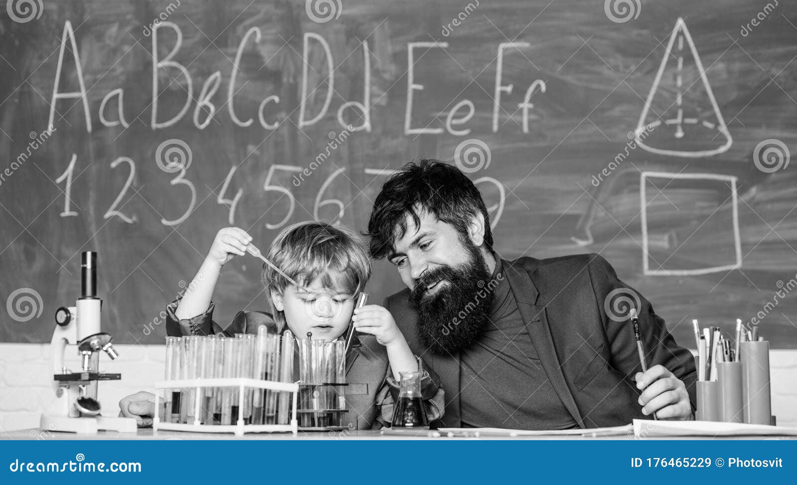 Wisdom. Back To School. Son and Father at School. Formula. Experiments