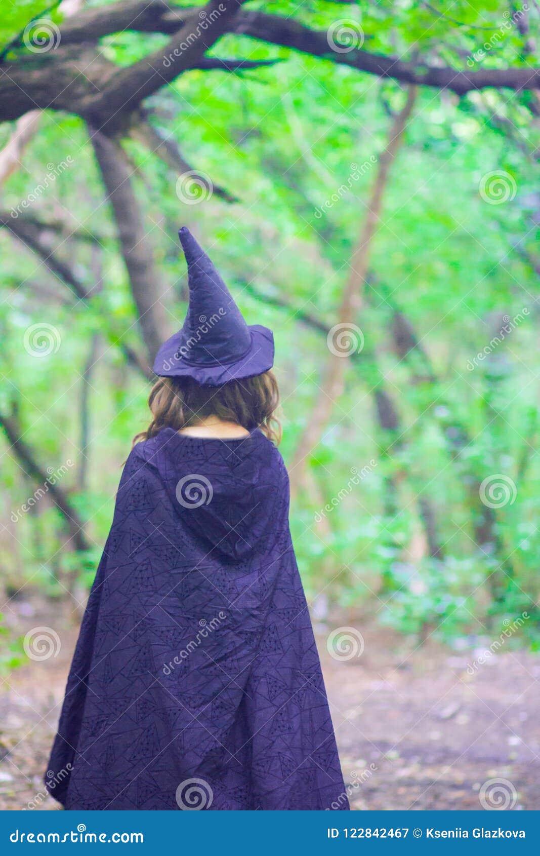 A Witch in a Hood and a Cloak Stock Image - Image of gathering ...