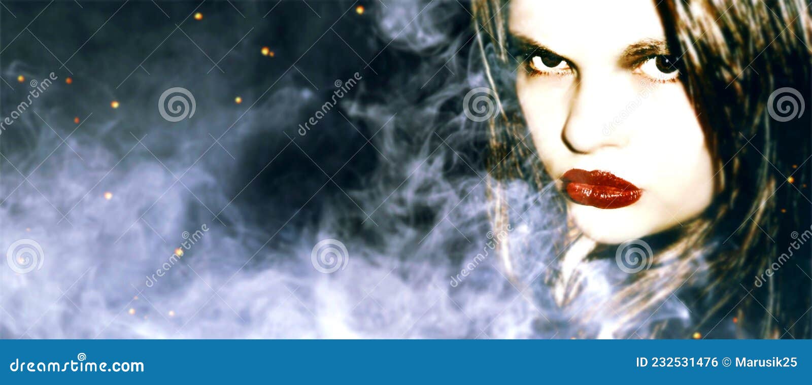 angry face girl with bright makeup in smoky haze