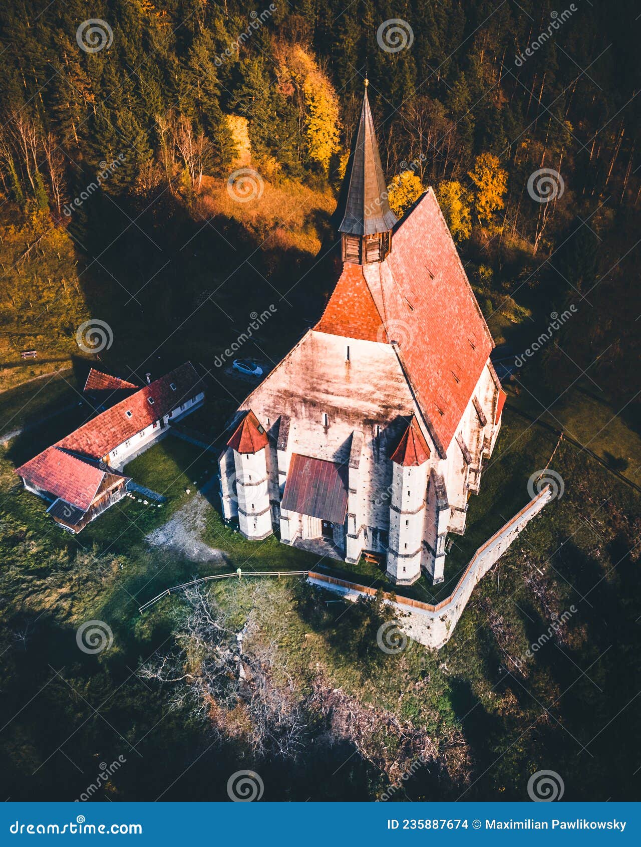 the wofgangskirche, a gothic catholic church in the austrian village kirchberg am wechsel aerial view