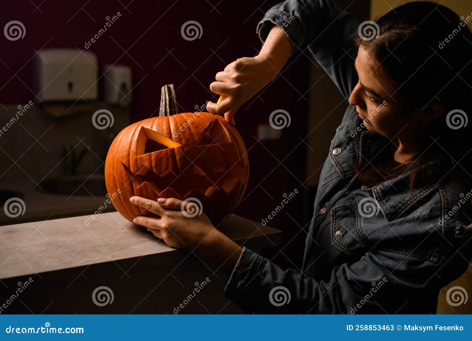 Carved Pumpkins, Smiling, on a Table Out of Doors Facing and Side