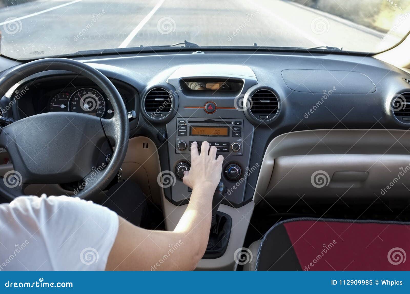 adjusting steering wheel while driving