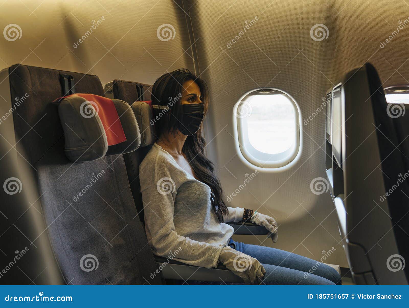 Woman in a Airplane with Face Mask Protection, Coronavirus COVID19 ...