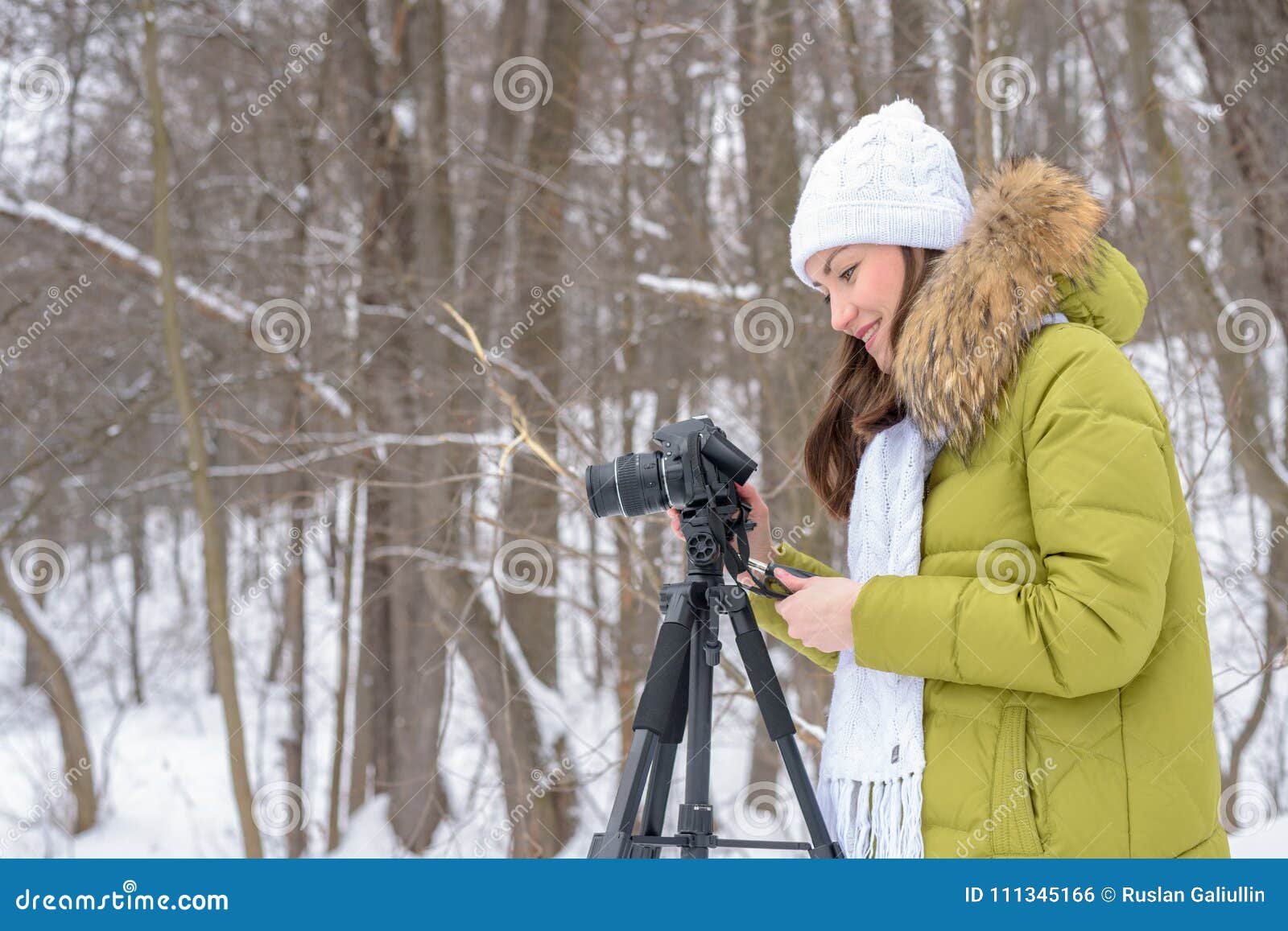 Woman Amateur Photographer Takes A Winter Landscape On The Lake In The Forest Copy Space Stock 