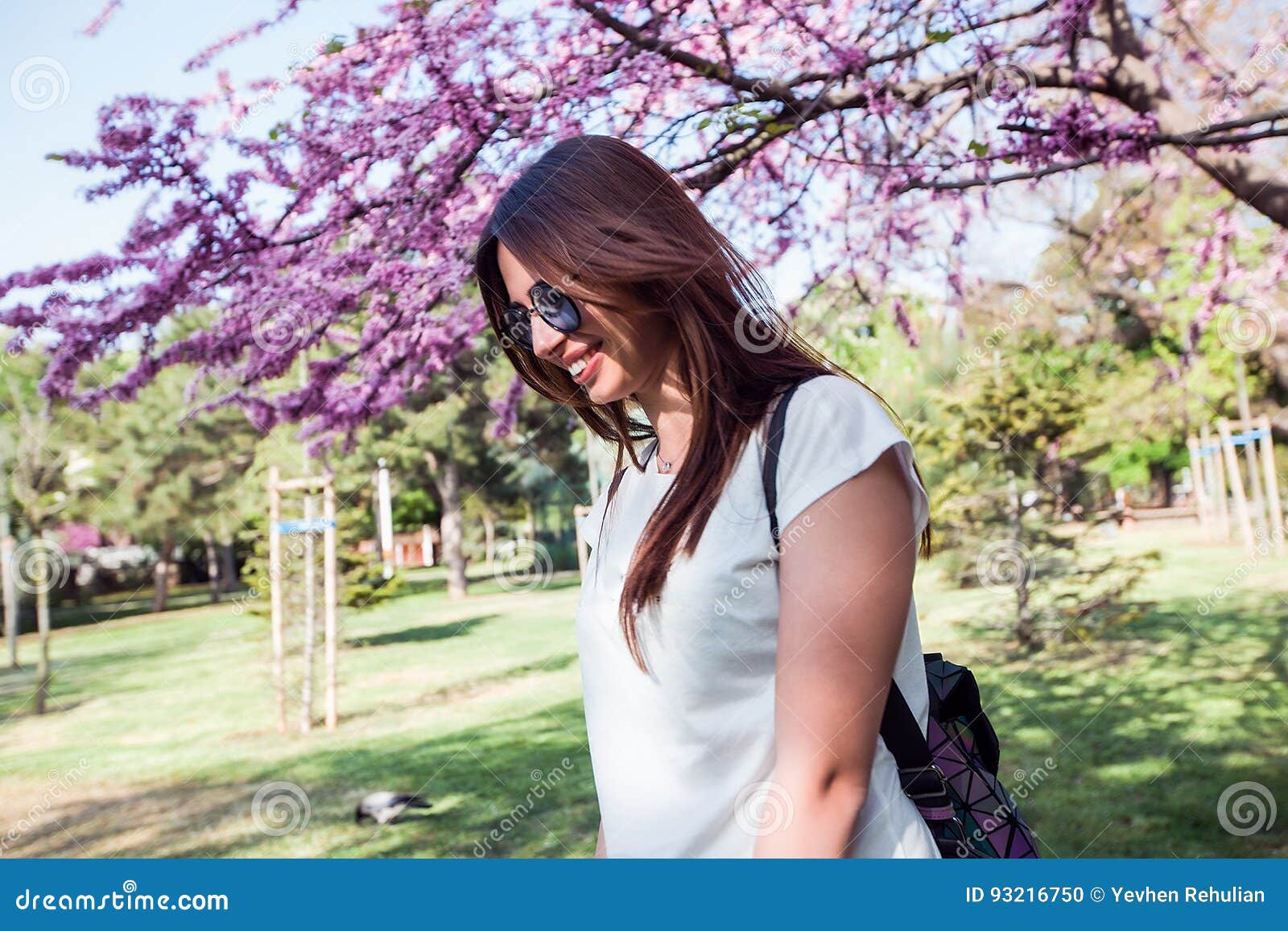 Woman on Amazing Blooming Tree Background.Stylish Backpack,spring ...