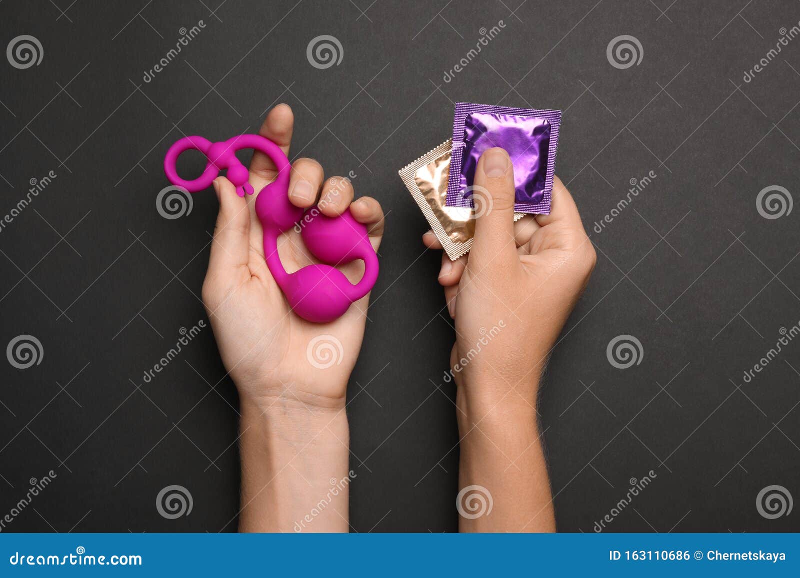 Woman with Anal Balls Beads and Condoms on Background, Top View pic