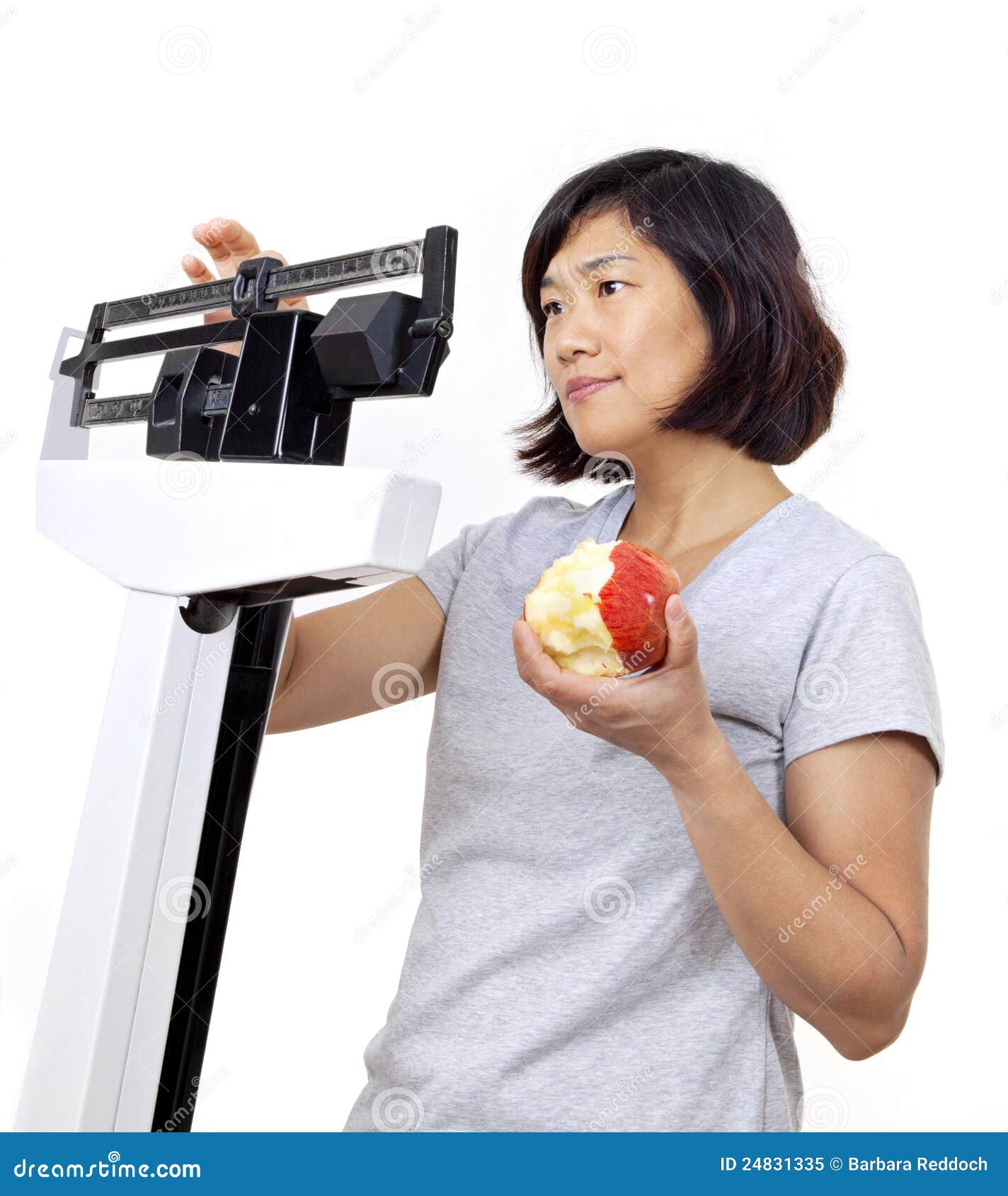 Woman with Apple on Scale Worried about Weight Stock Image Image of