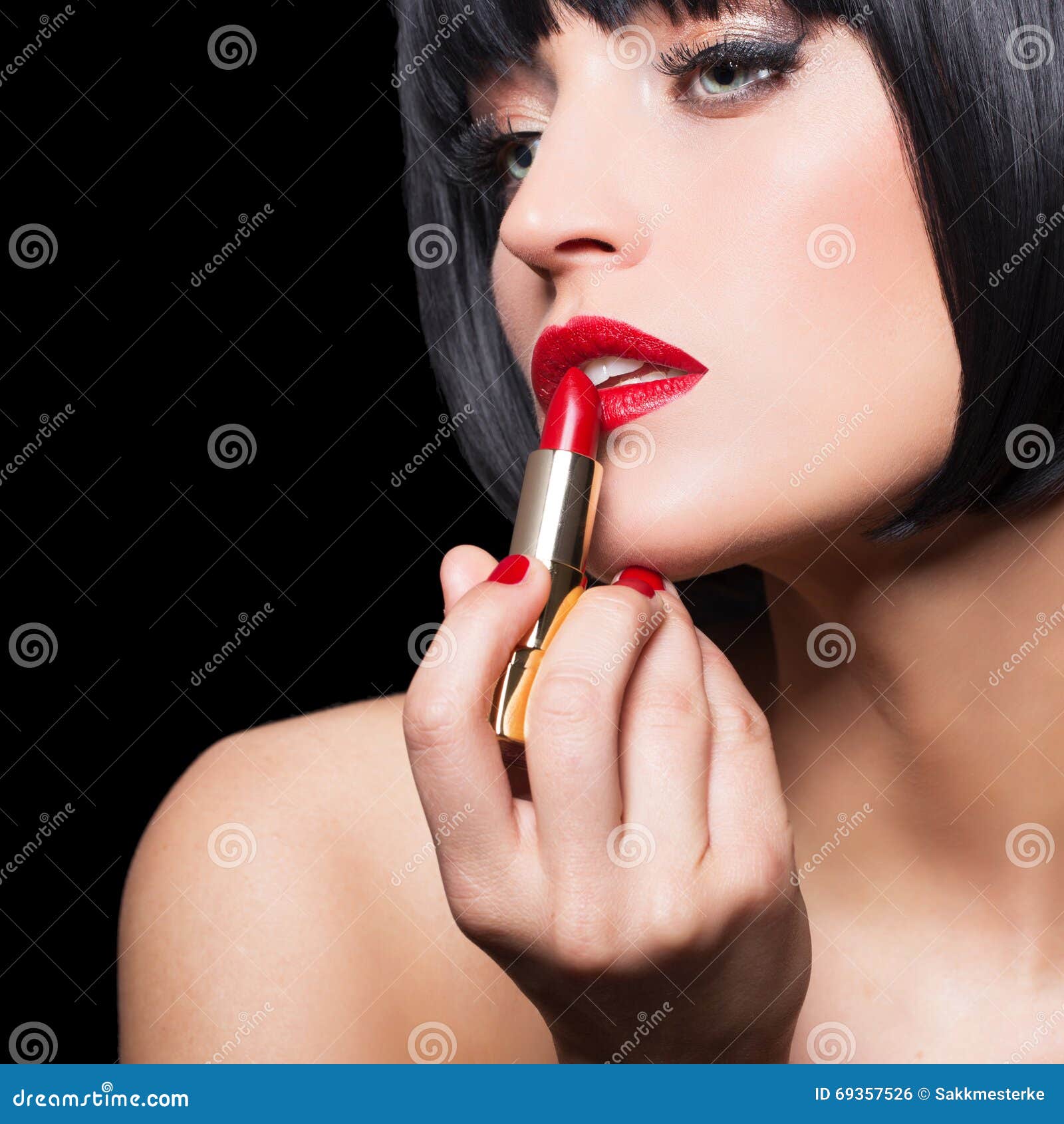 Woman apply red lipstick stock photo. Image of sensual 69357526