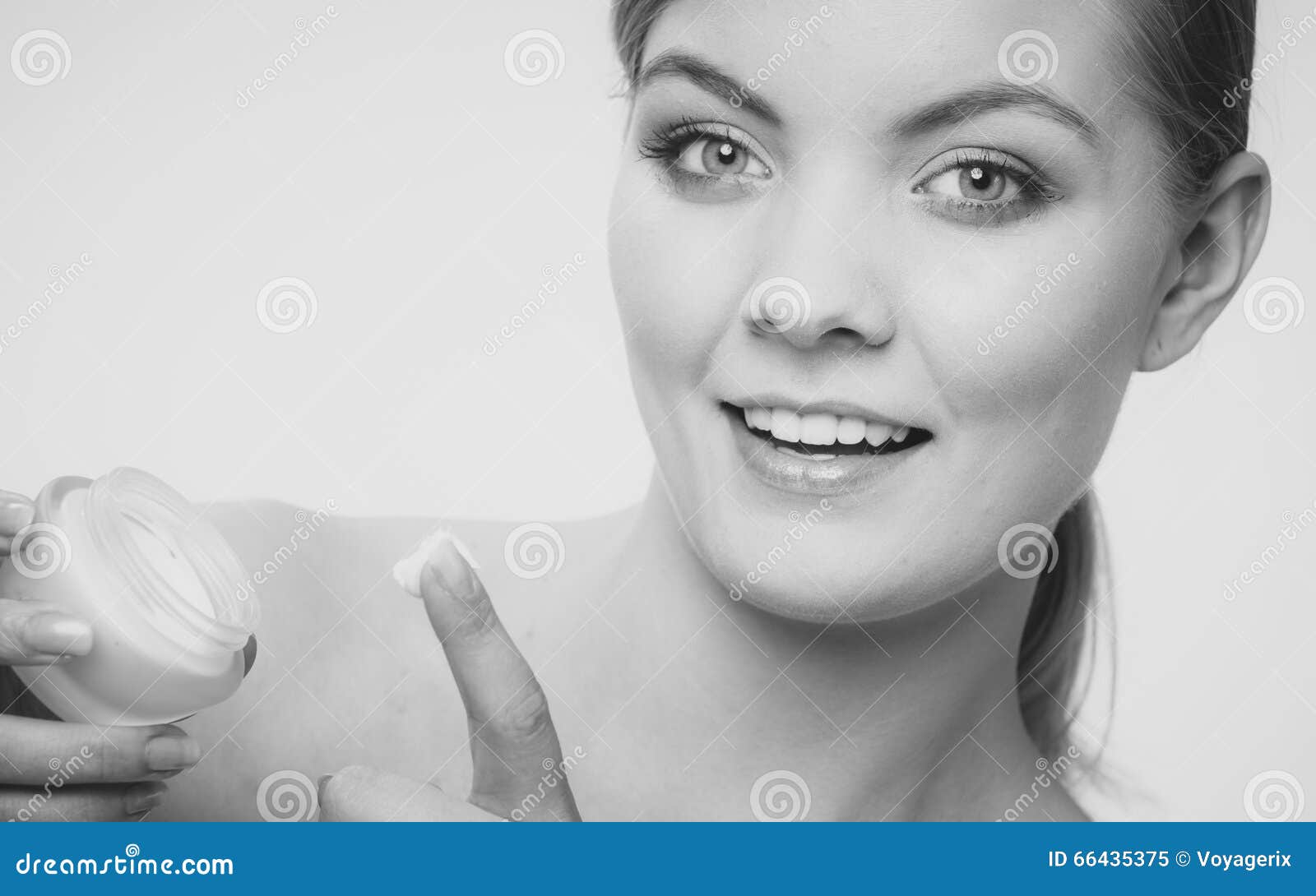 Woman Applying Cream On Her Skin Face Stock Image Image Of Health Skincare 66435375