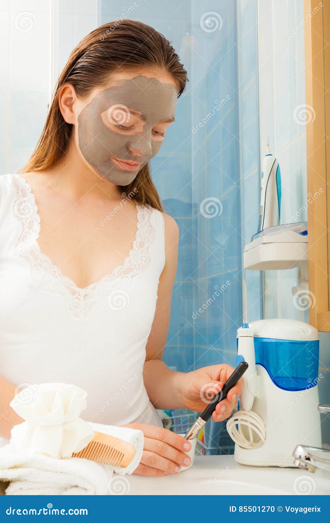 Woman Applying Mud Facial Mask Stock Photo - Image of complexion, clay ...