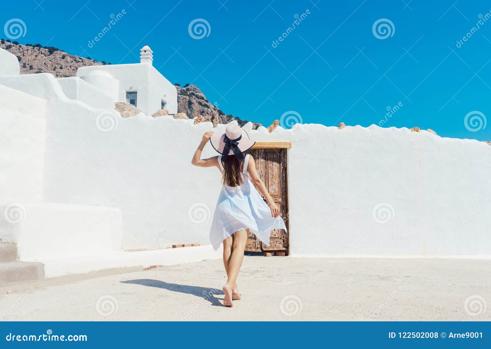 Woman Approaching a Greek House Stock Photo - Image of home, tourism ...