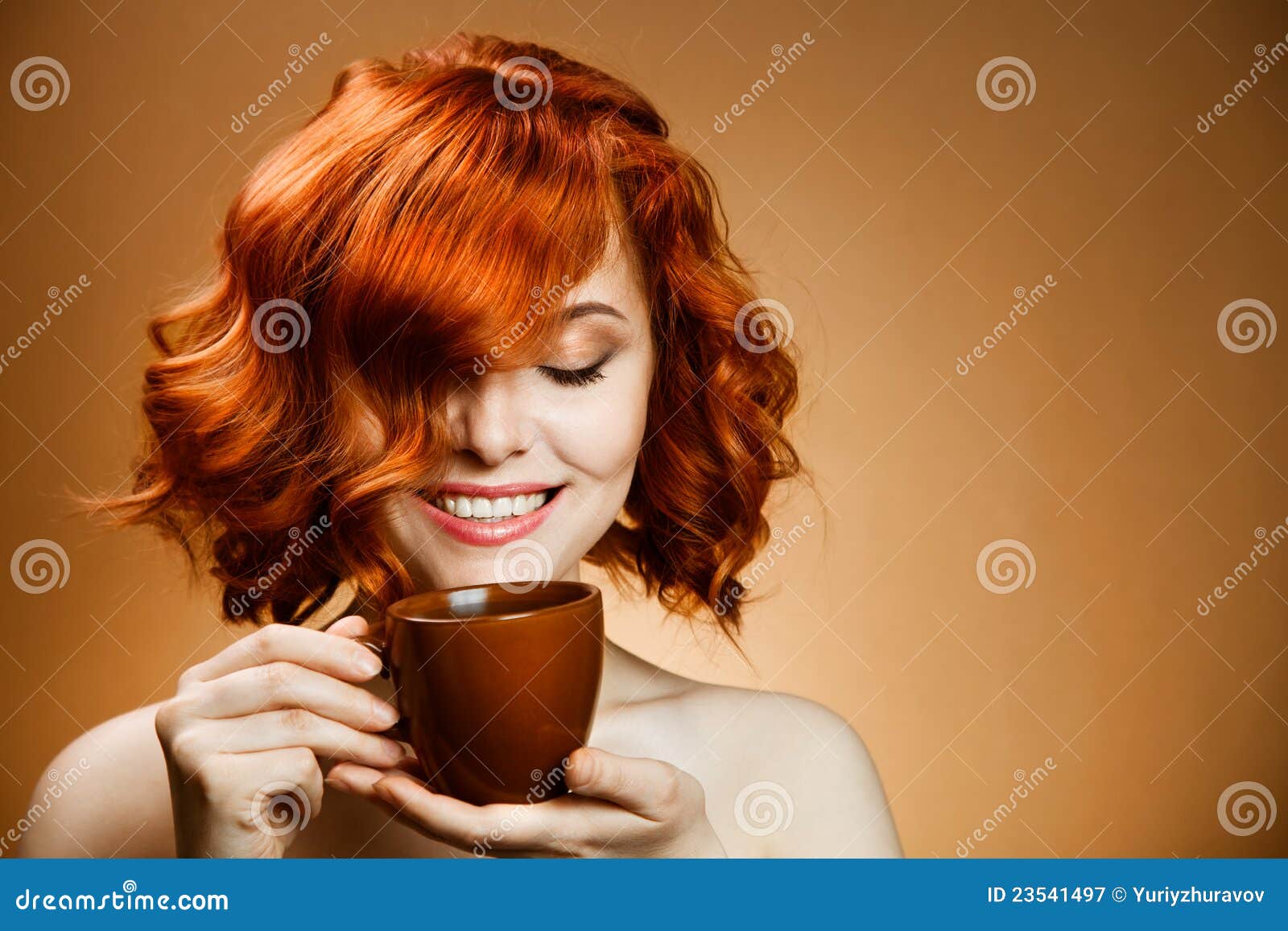 woman with an aromatic coffee in hands
