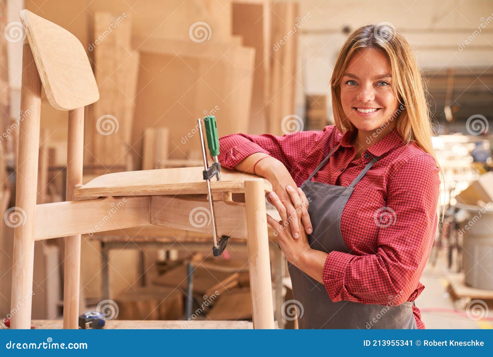 Woman As a Carpenter`s Apprentice Gluing Chair Stock Image Image of