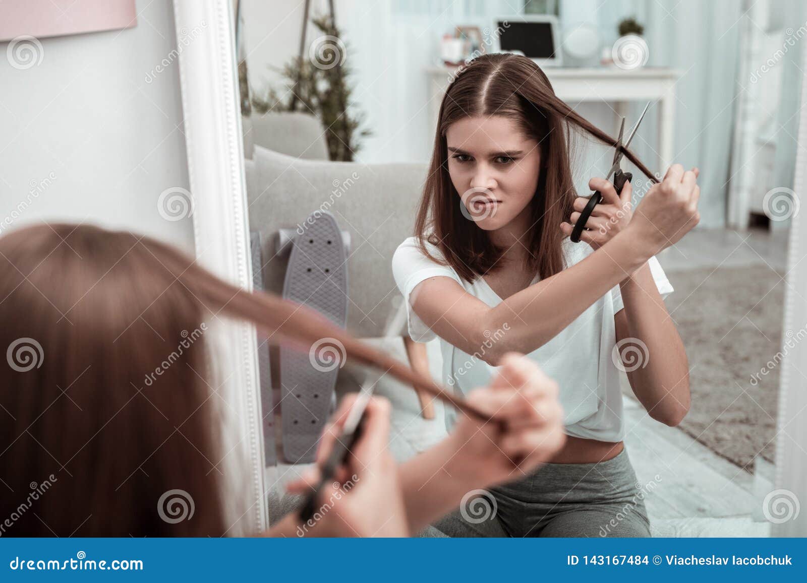 Woman Attempting To Cut Her Hair Herself Stock Photo - Image of teen, body: 143167484 Woman Attempting To Cut Her Hair Herself Stock Photo - Image of teen, body: 143167484