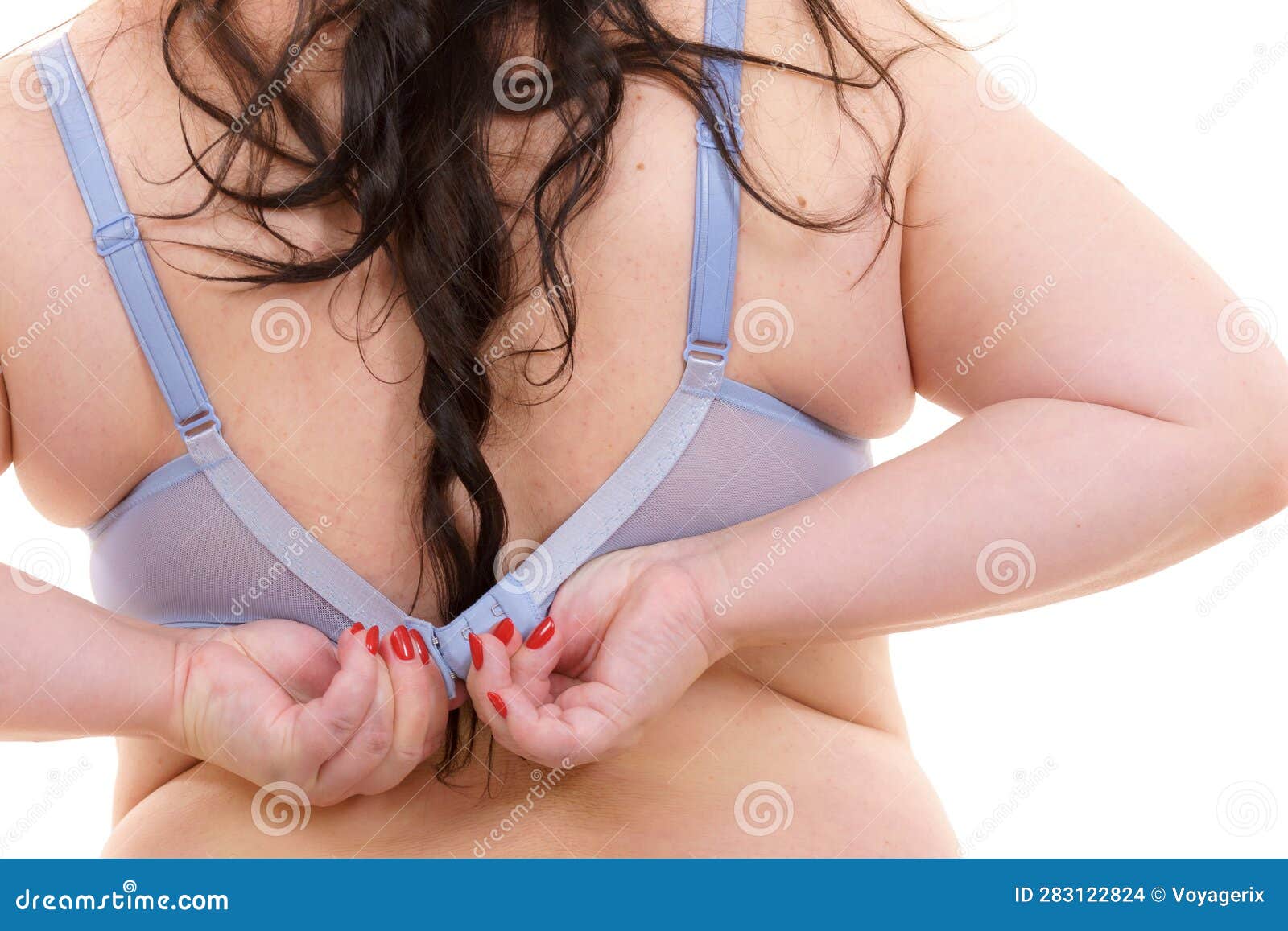 Elderly Woman's Hands Fastening Her Bra Stock Photo, Picture and Royalty  Free Image. Image 42355826.