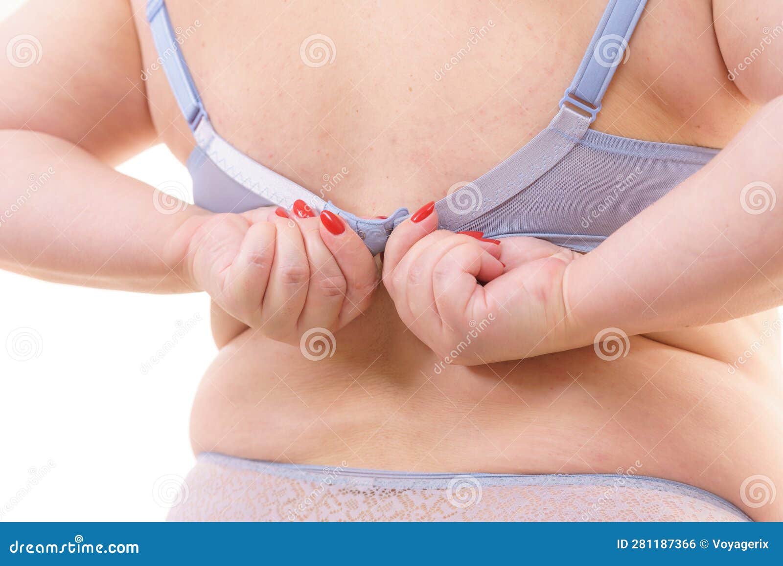 Woman Fastening Green Front Fastening Bra Stock Photo by