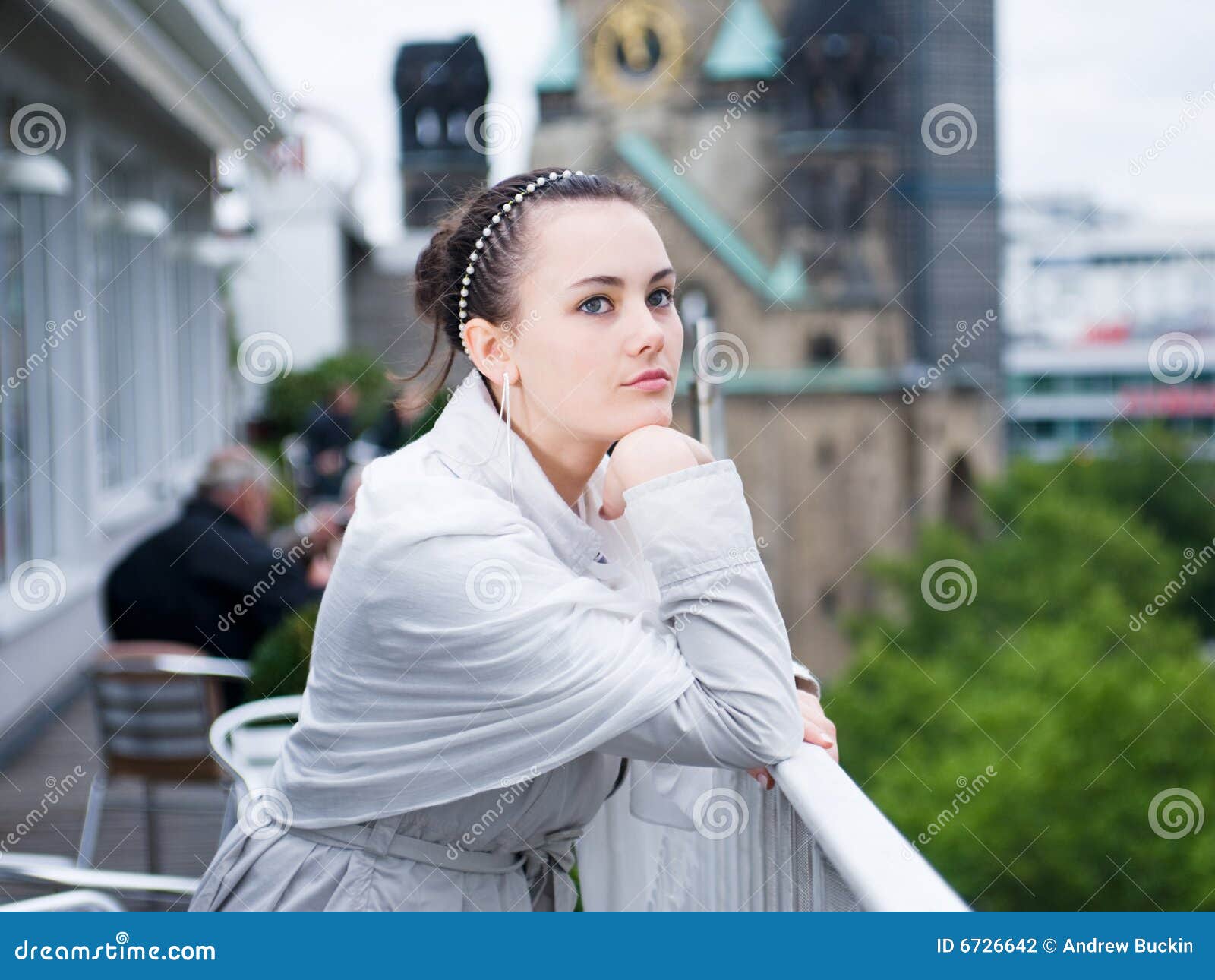 Young Woman On Balcony Sunset High-Res Stock Photo - Getty 