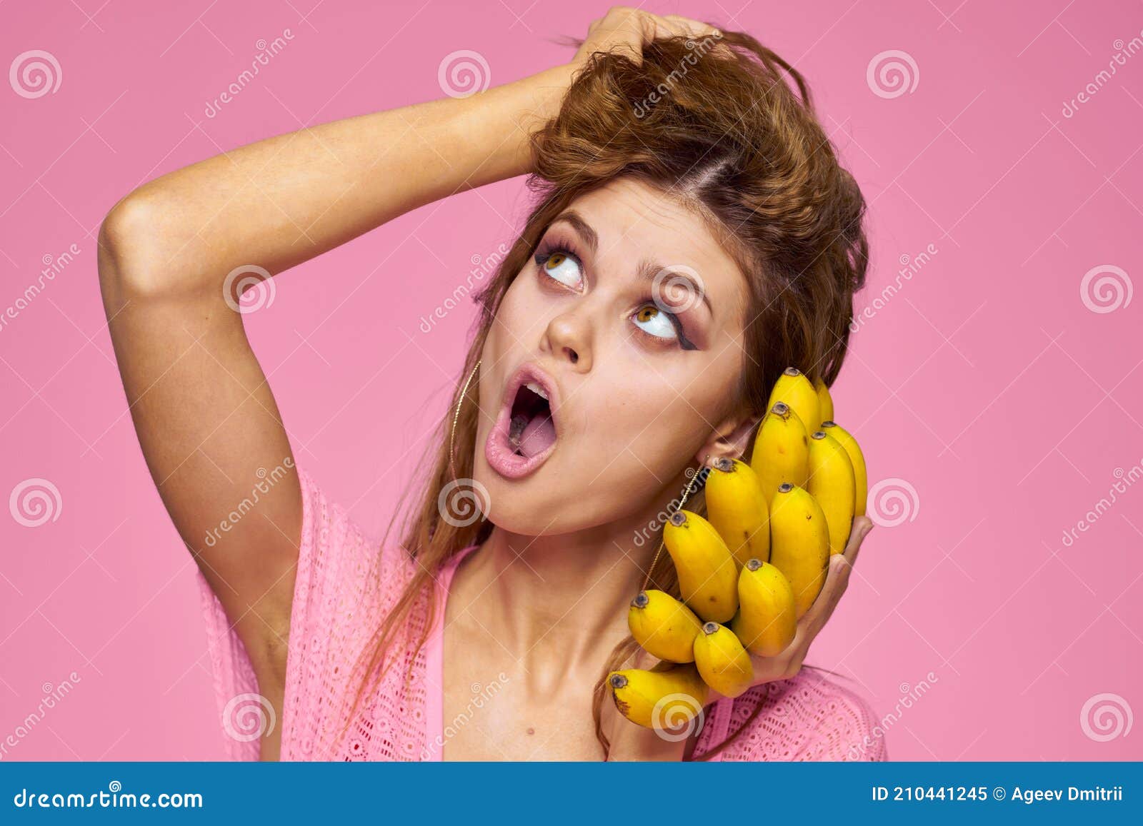 Woman With Bananas Wavy Hair Fruits Lifestyle Bright Makeup Pink Background Stock Image Image 