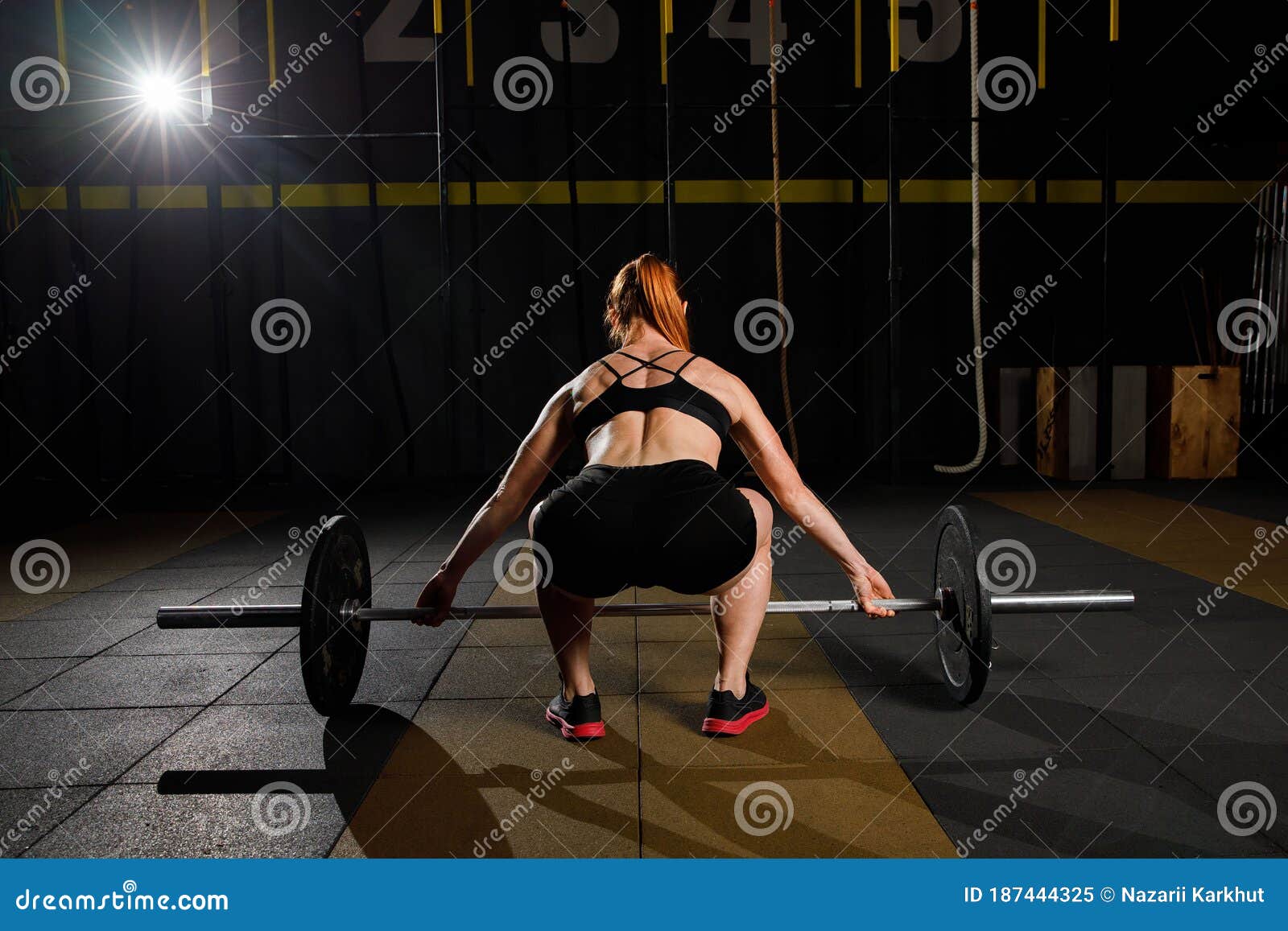 Woman with Barbell Caucasian Female Performing Deadlift Exercise with ...