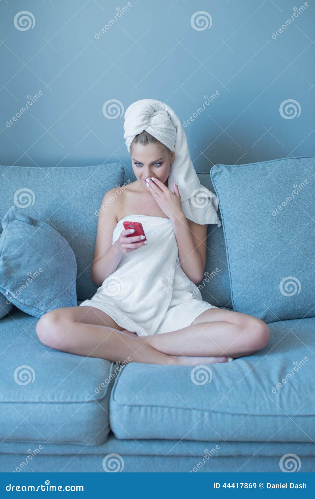 Woman In Bath Towel With Cell Phone On Sofa Stock Image Image Of Girl
