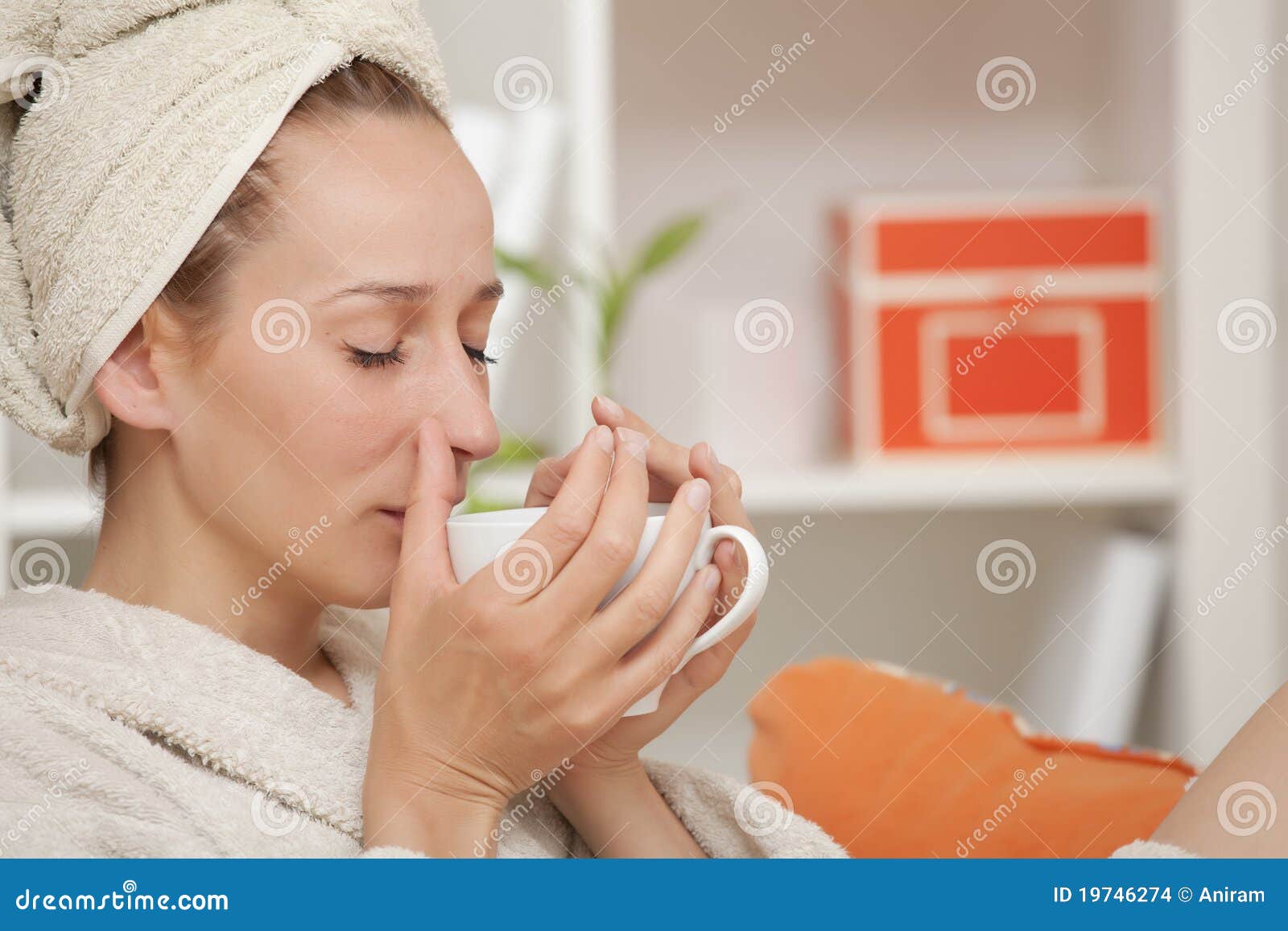 Woman in Bathrobe Drinking Tea Stock Photo Image of leisure, sofa