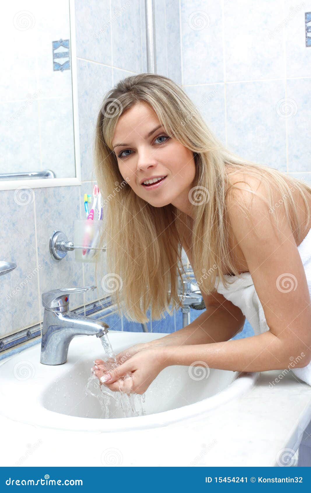 Woman in the bathroom stock image. Image of clean, enjoying - 15454241