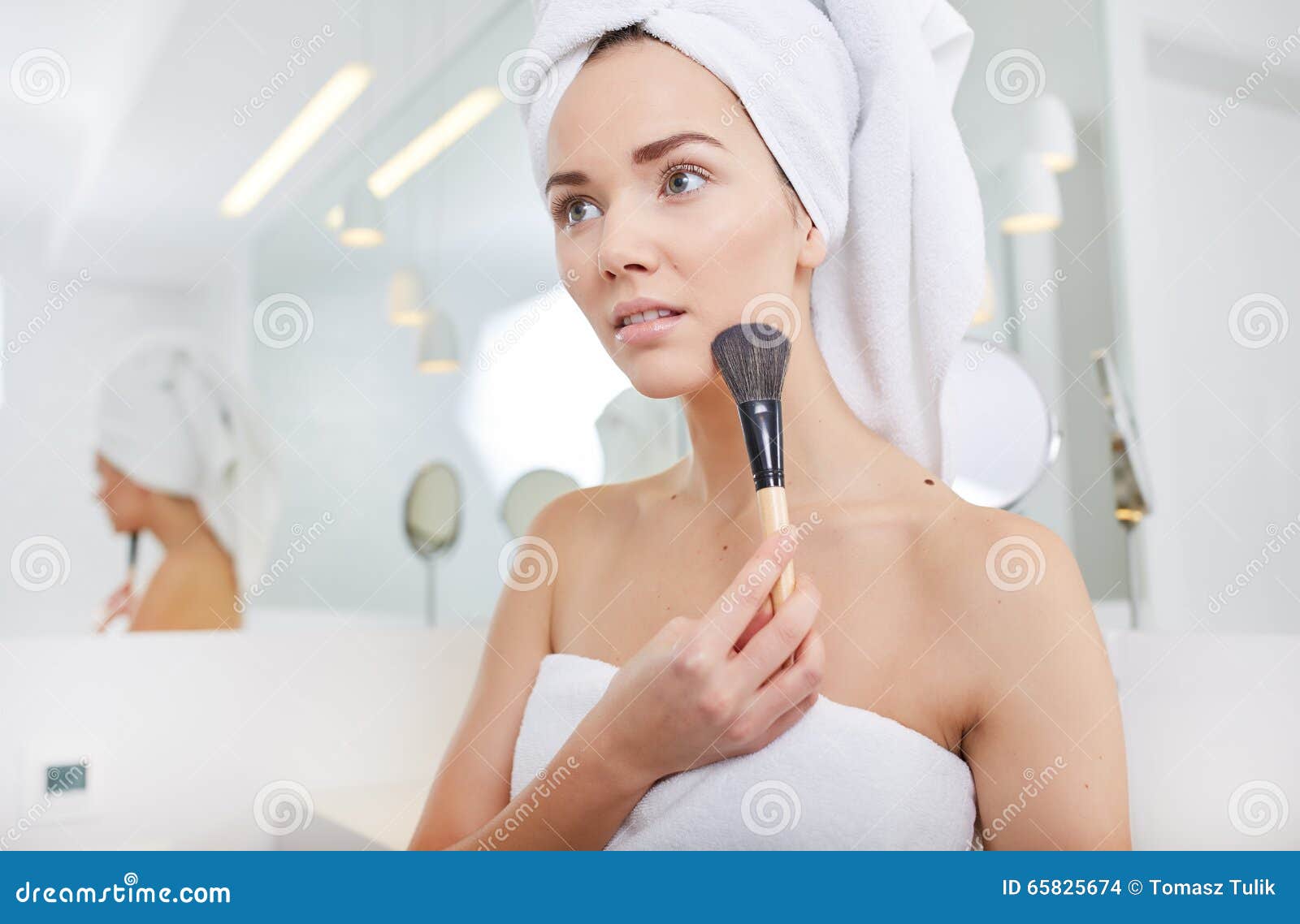 Woman in Bathroom Applying Makeup on Stock Photo Image of pampering