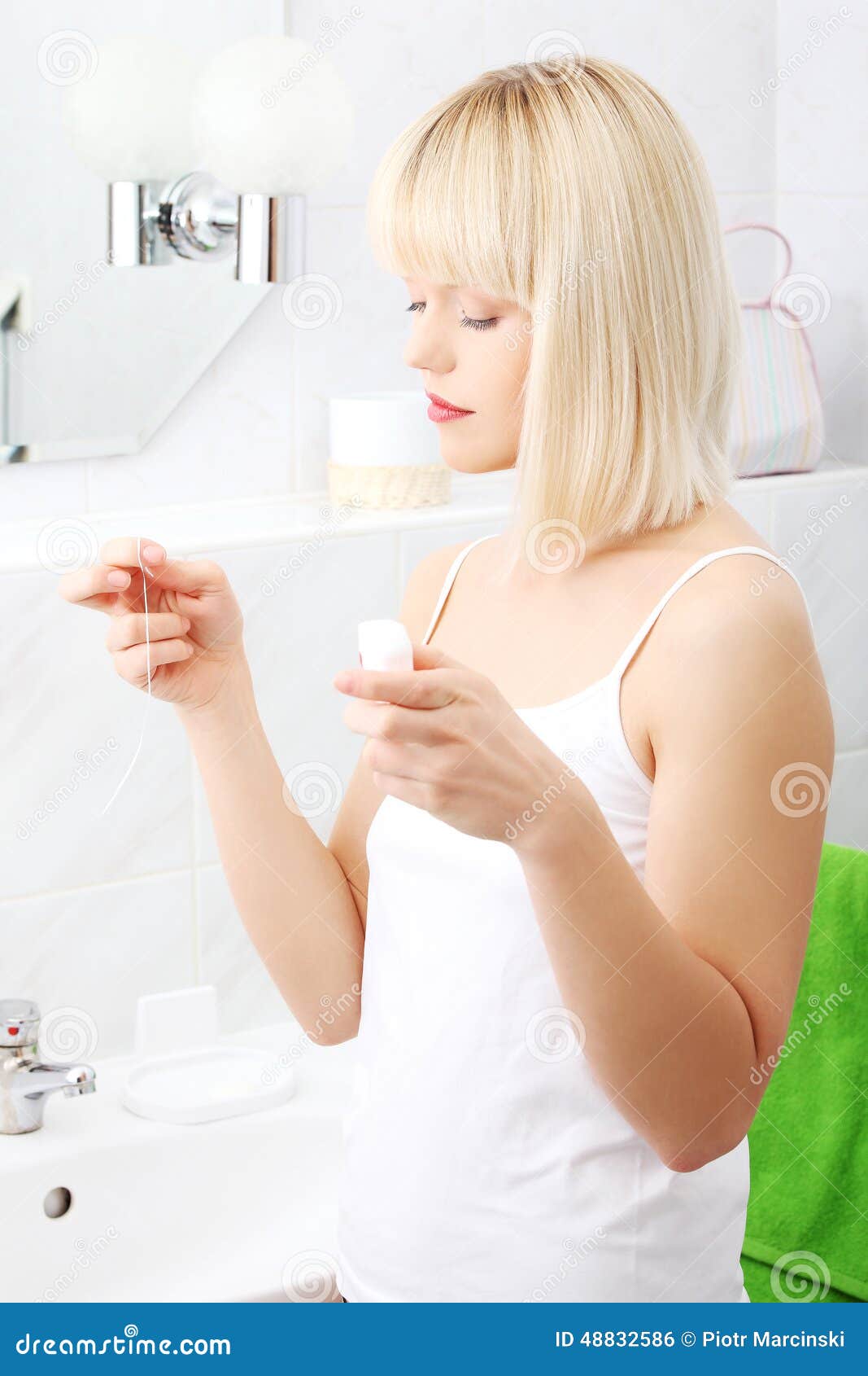 Woman in Bathroom with Dental Floss Stock Photo Image of caucasian