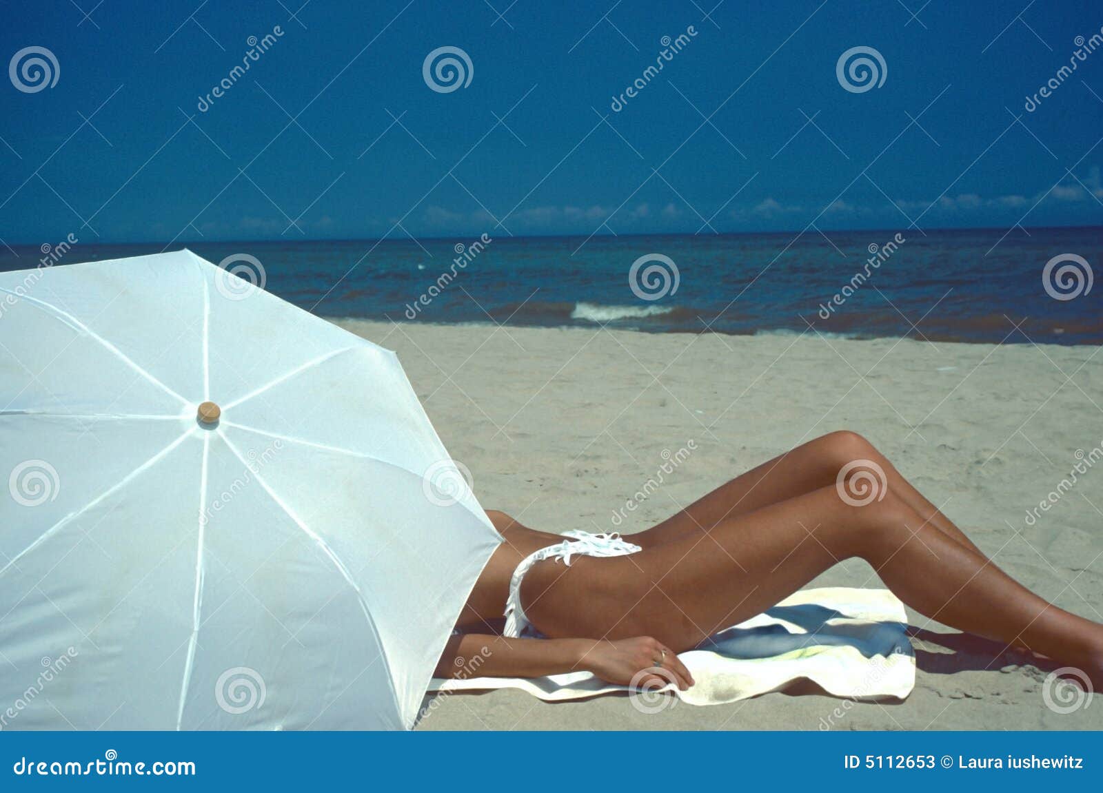 Woman Beach and White Umbrella Stock Image - Image of lake, natural: 5112653