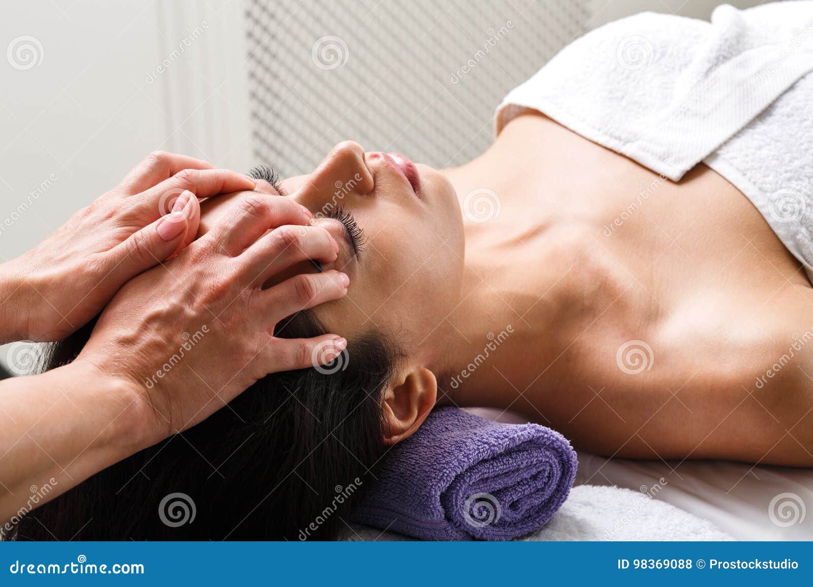 Woman Beautician Doctor Make Head Massage In Spa Wellness Center Stock