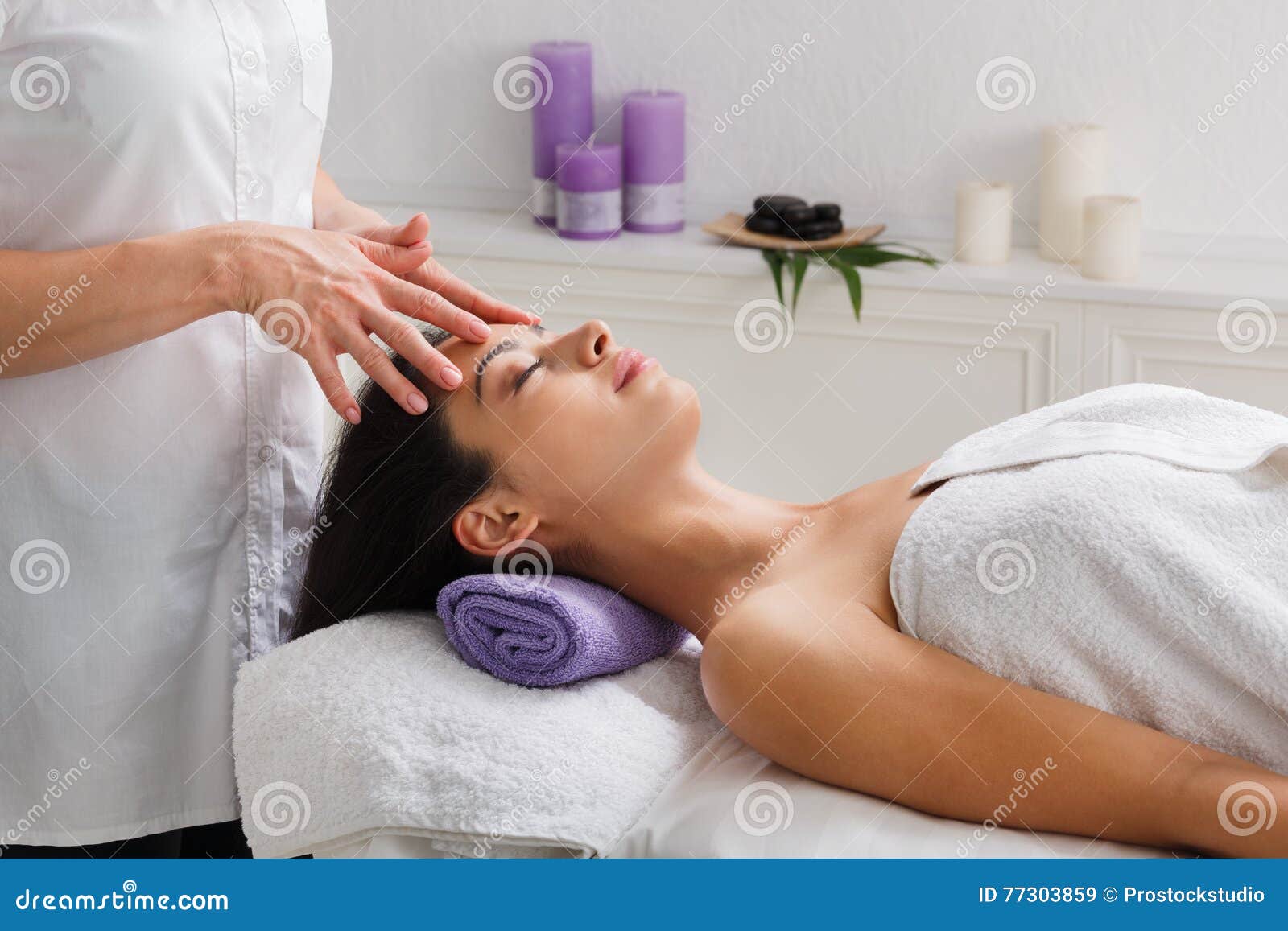 Woman Beautician Doctor Make Head Massage In Spa Wellness Center Stock