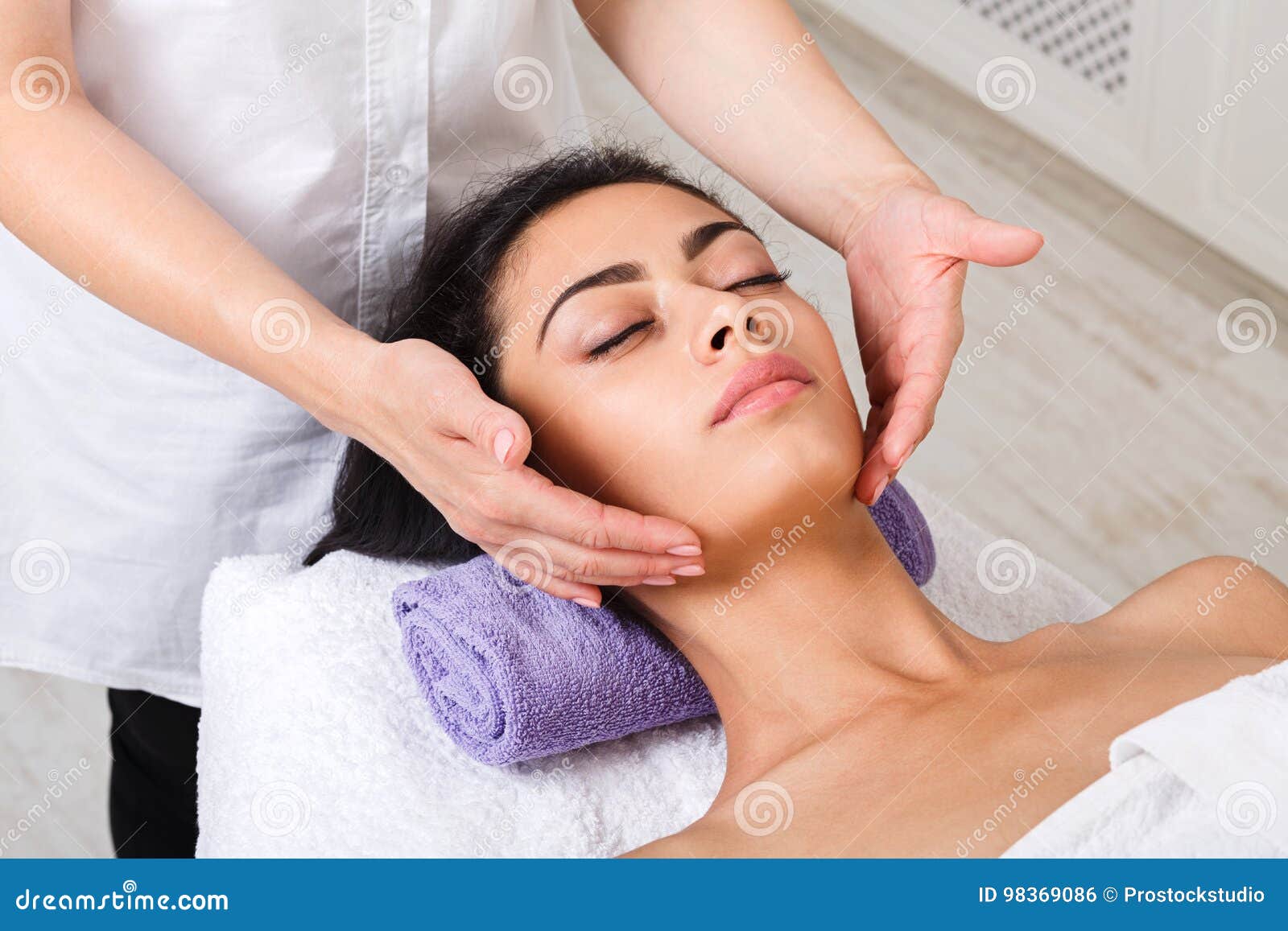 Woman Beautician Doctor Make Neck Massage In Spa Wellness Center Stock
