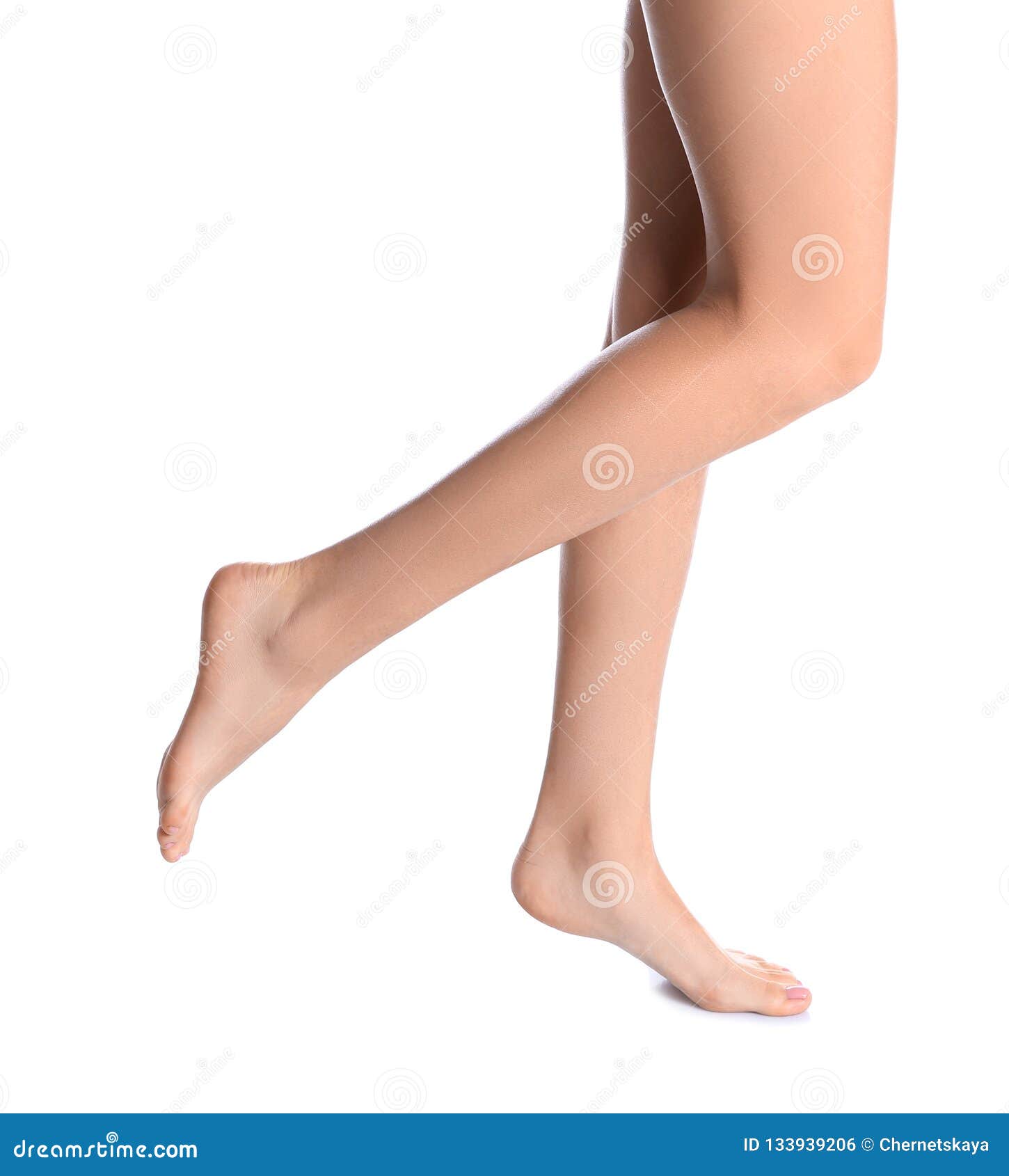 Side View Beautifully Cared Women's Legs Feet White Background