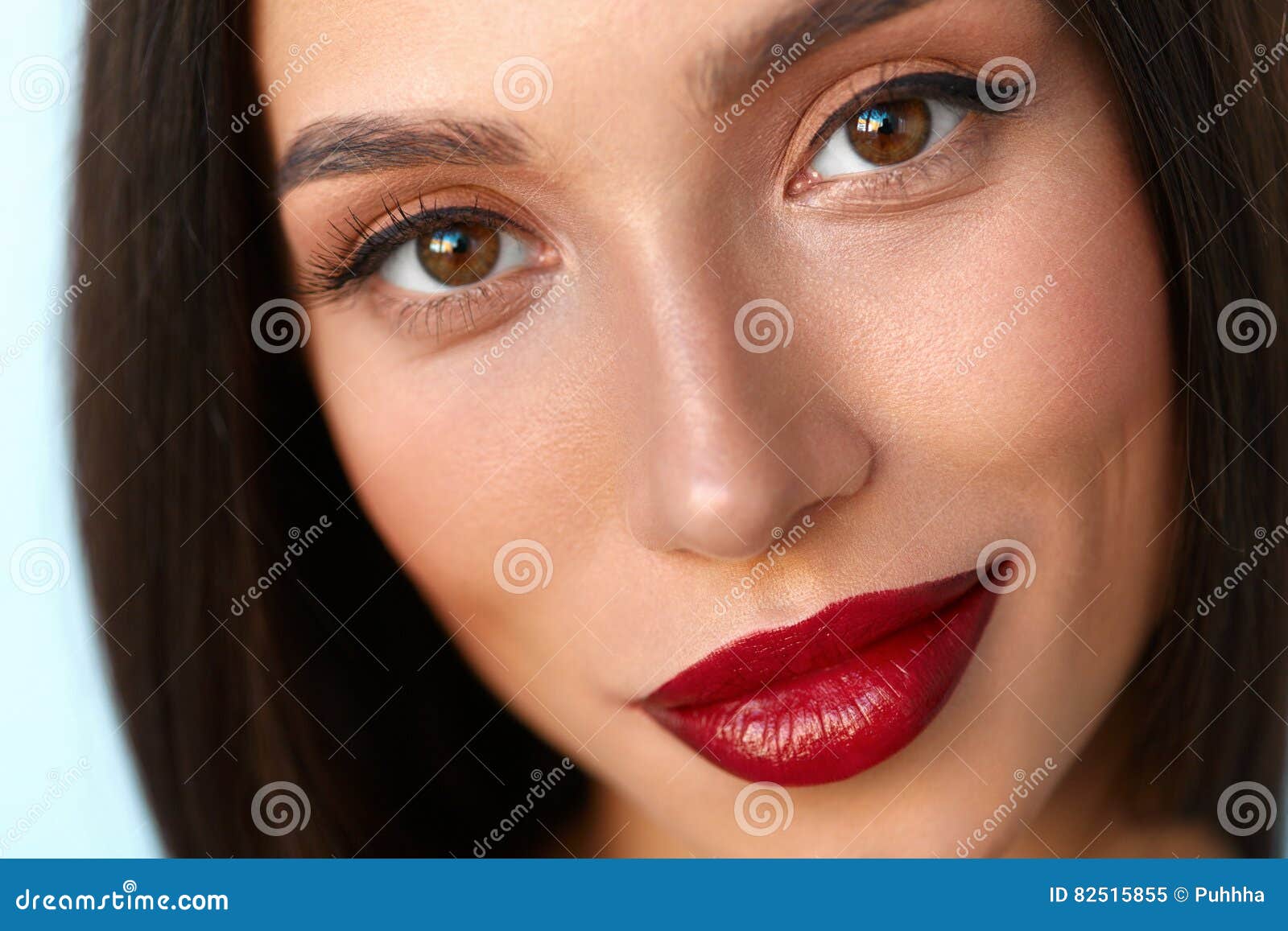 Woman With Beauty Face And Beautiful Makeup And Red Lips Stock Image