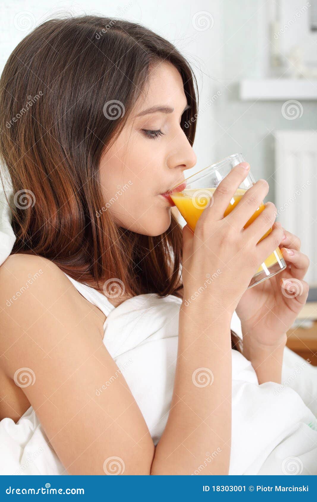 Woman in Bed Drinking Orange Juice Stock Image Image of comfort