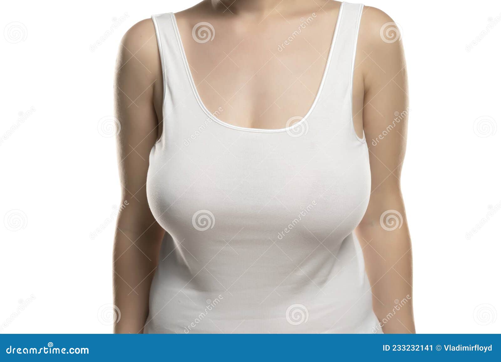 A Woman with Big Breasts without a Bra in a White Shirt Stock