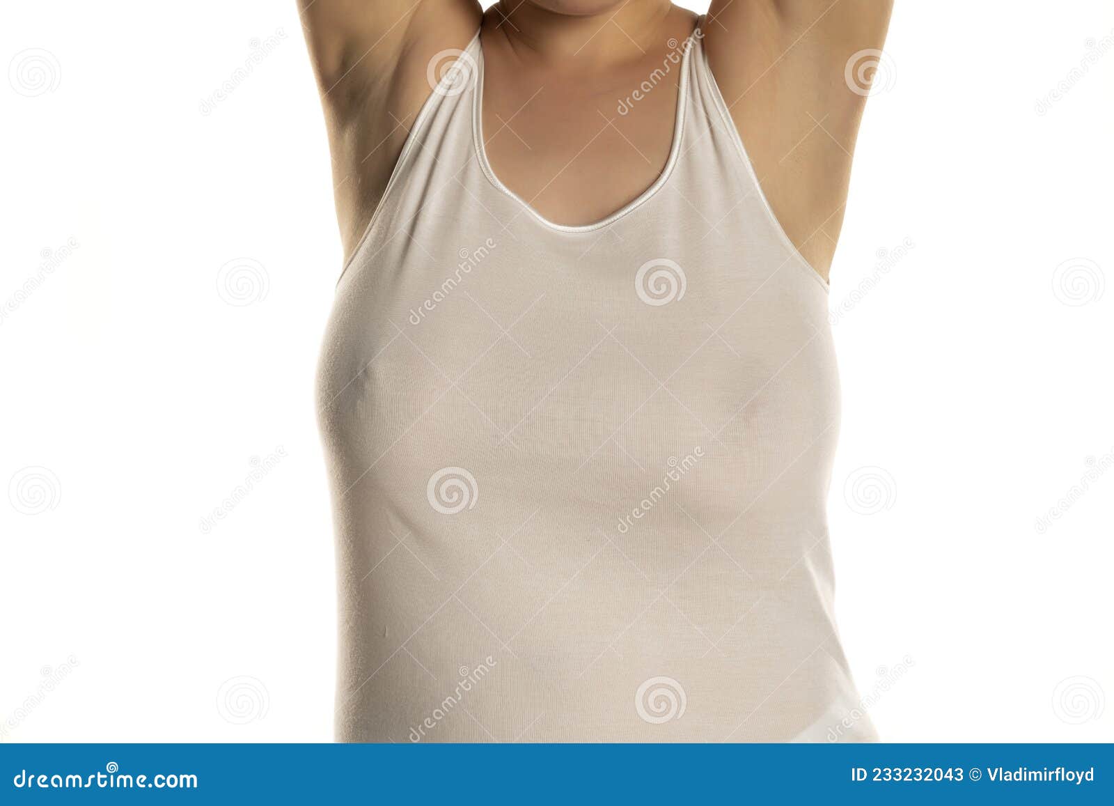 A Woman with Big Breasts without a Bra in a White Shirt Stock