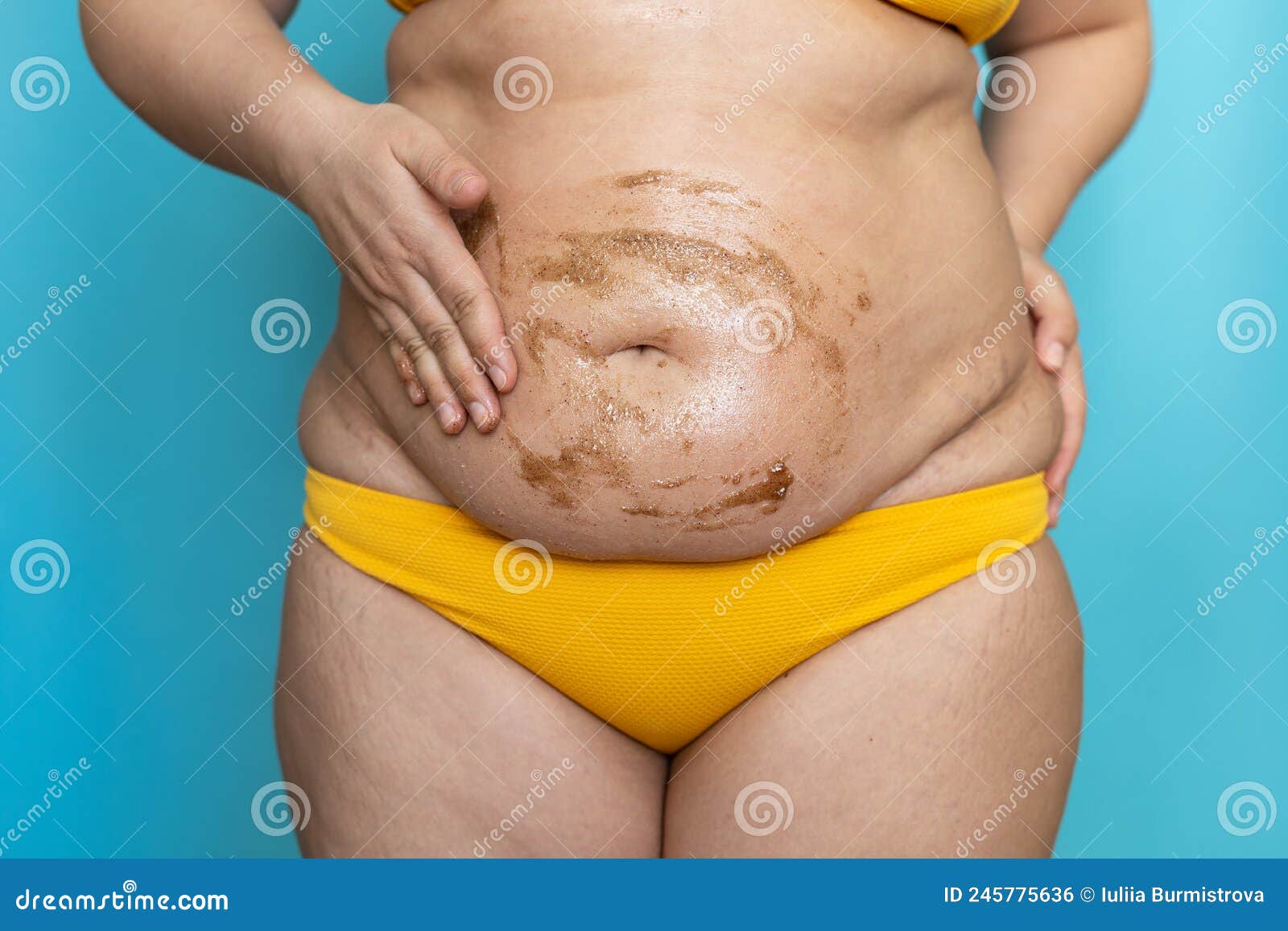 Woman with Big Stomach and Buttocks in Yellow Underwear Smear Coffee Body  Scrub on Belly Closeup. Doing Tummy Massage Stock Photo - Image of natural,  background: 245775636