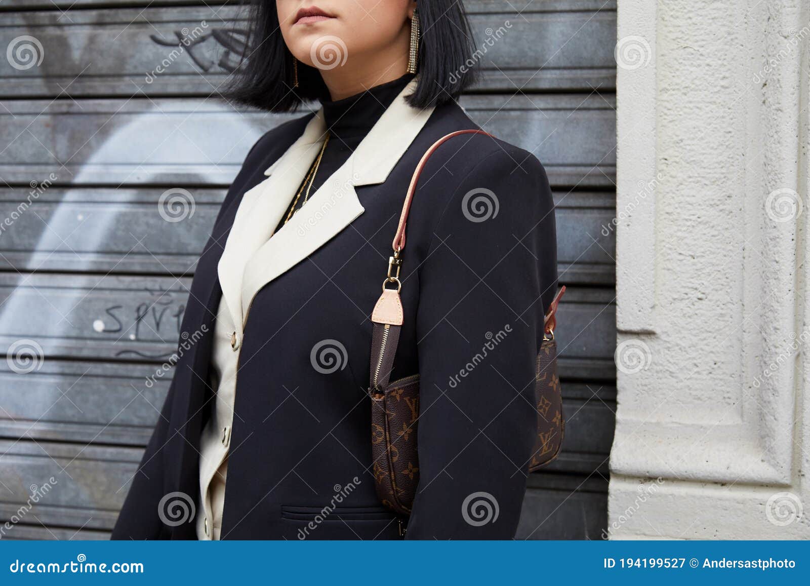 Woman with Black and Beige Jacket and Louis Vuitton Bag before Boss Fashion  Show, Milan Fashion Editorial Photography - Image of elegant, black:  194199527