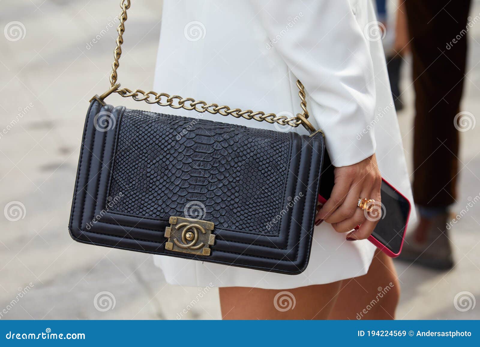 Woman with Black Crocodile Leather Chanel Bag before Tiziano Guardini  Fashion Show, Milan Editorial Stock Image - Image of leather, september:  194224569