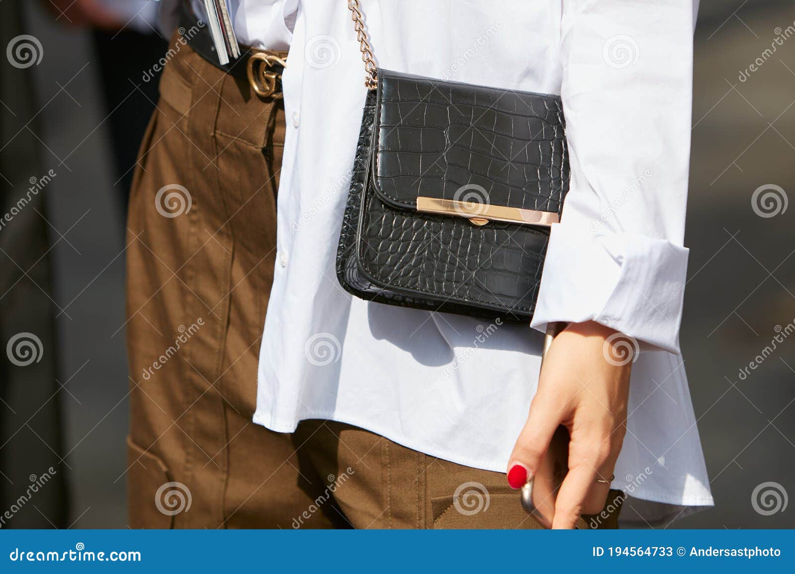 Woman with Black Crocodile Leather Jacket, Brown Trousers and