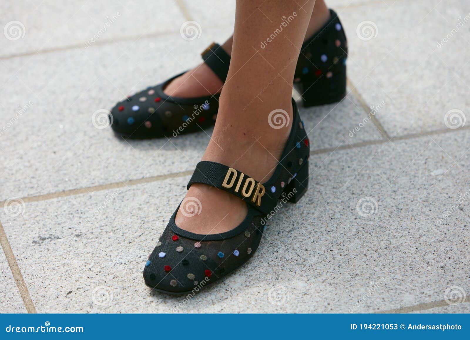 MILAN, ITALY - SEPTEMBER 20, 2019: Woman with brown Louis Vuitton checkered  bag, white dress and Dior bracelets before Sportmax fashion show, Milan Fa  Stock Photo - Alamy